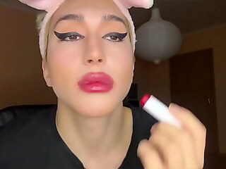 Sissy gets teased with makeup by dominant partner.